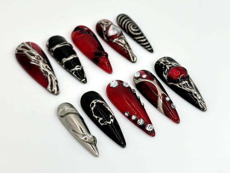 Unique Gothic-Inspired Long Stiletto Nails Edgy Black & Red Metallic Nails Long Stiletto with Silver Details Gothic Style OB589HK