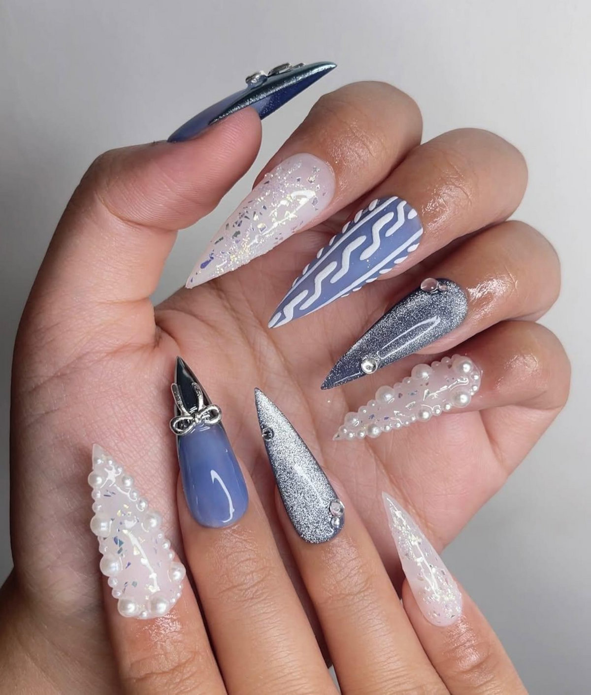 Frosted Winter Elegance Christmas Nails Icy Blue Chrome Nail Art Pearl Snowflake Design Winter Wonderland Nails Luxury Nail
