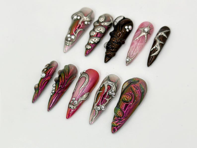 Gothic Metallic Stiletto Nails Futuristic Metallic and Pink Nails with 3D Designs Art Deco-Inspired Chrome 3D Silver DetailsOB600HK