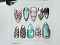 Chrome Abstract Press On Nails Y2K Futuristic Jellybean Fake nails Star & Flower Art Nail Art Futuristic Y2K Chrome Nails OB941YK