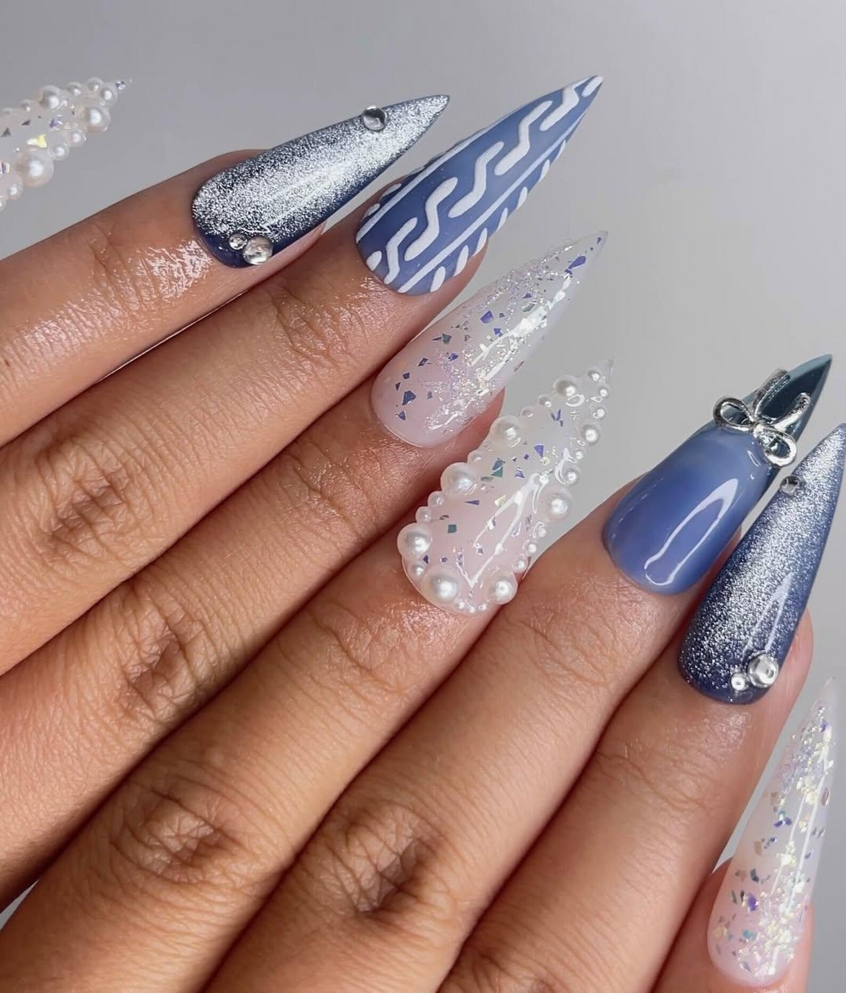 Frosted Winter Elegance Christmas Nails Icy Blue Chrome Nail Art Pearl Snowflake Design Winter Wonderland Nails Luxury Nail