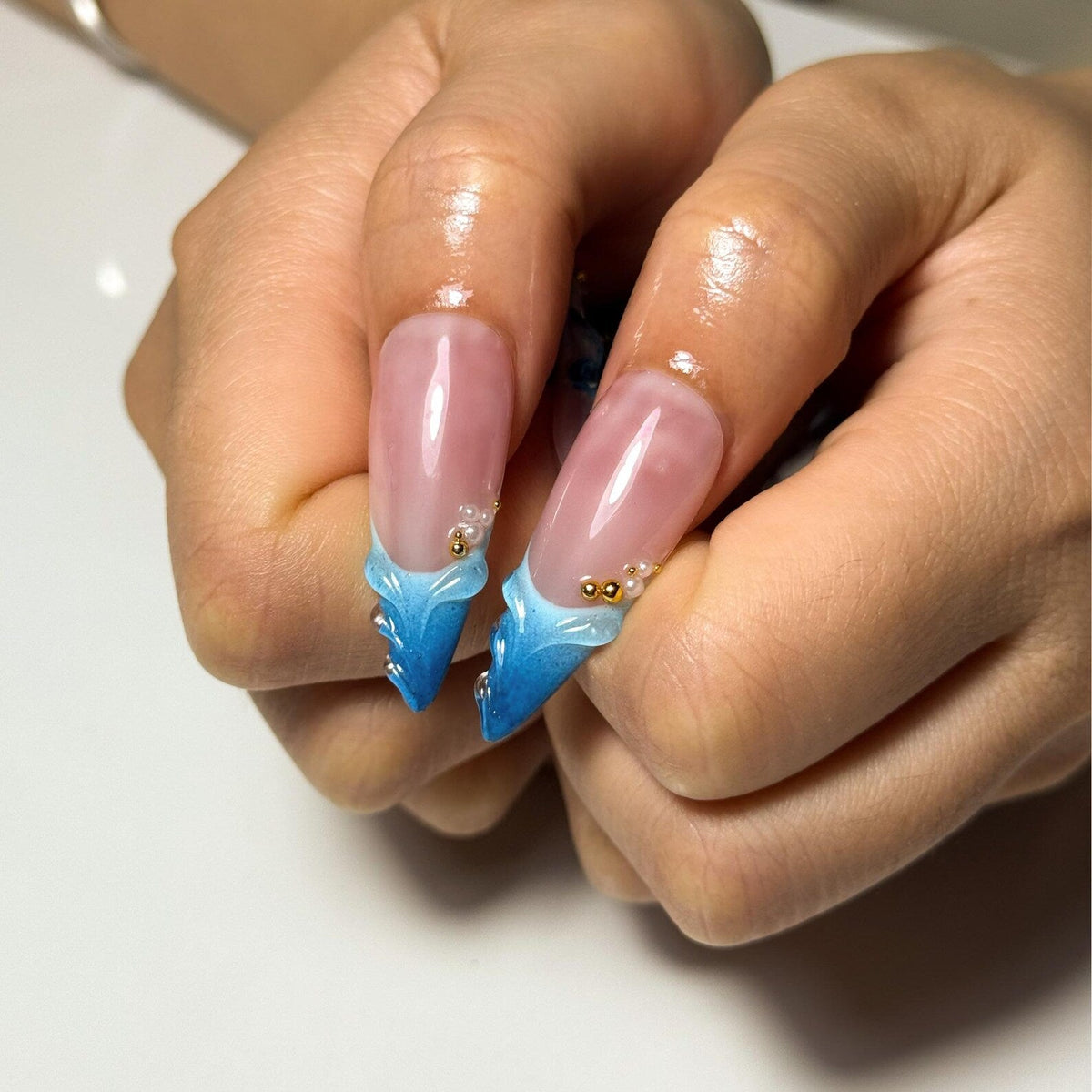 Blue Ocean Press On Nails with 3D Flower and Gold Detail Marble Coastal Nails in Almond