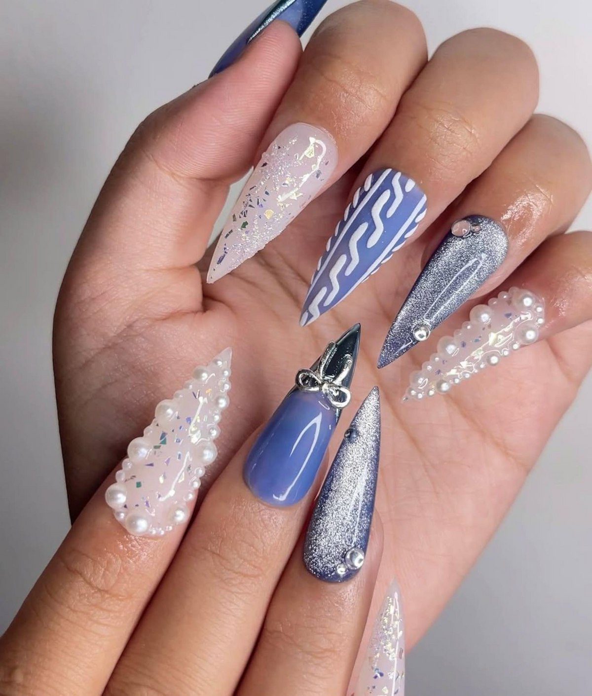 Frosted Winter Elegance Christmas Nails Icy Blue Chrome Nail Art Pearl Snowflake Design Winter Wonderland Nails Luxury Nail