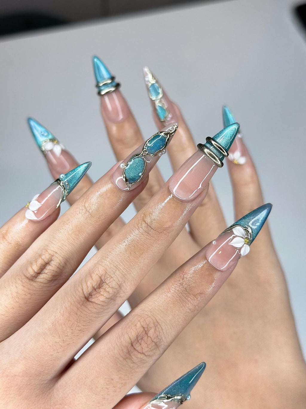 Teal Cat-Eye & 3D White Bloom Nails, Antique Gold Chrome Accents, Luxury Botanical