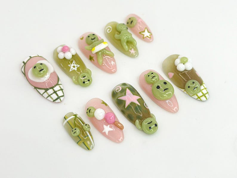 Kawaii Smiski-Inspired Press On Nails Smiski-Inspired 3D Nails with Pink and Green Accents Playful Smiski and Star Nail Set OB640HK