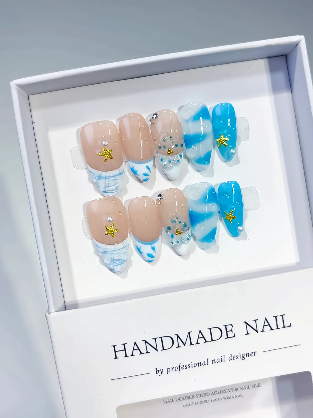 Medium Nude Blue Almond French tip Star Rhinestone
