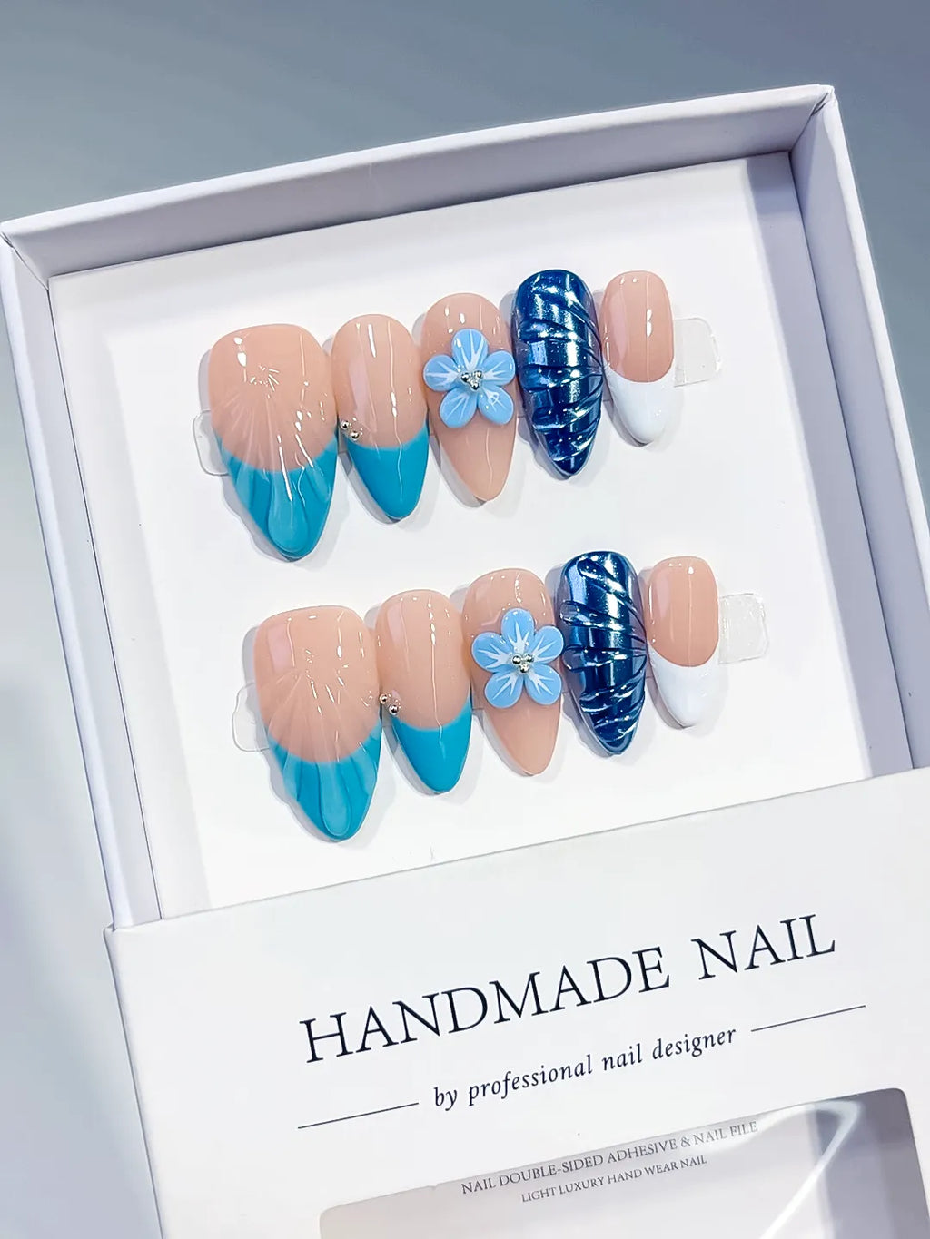 Medium Nude Blue Almond French tip Flower Cat Eye