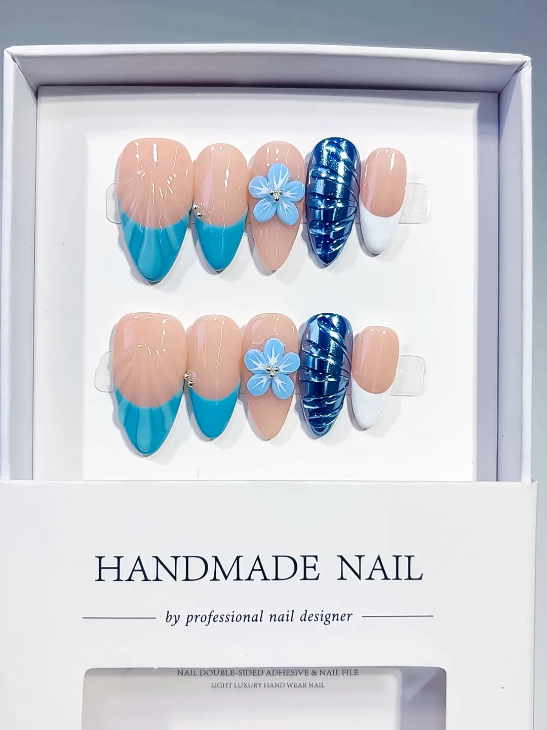 Medium Nude Blue Almond French tip Flower Cat Eye