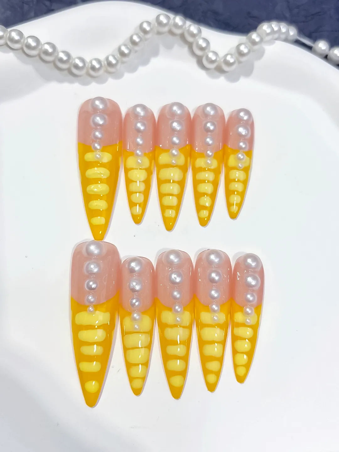 Long Nude Yellow Stiletto French tip Pearl
