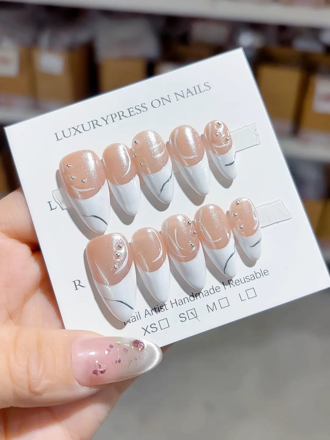 Medium White Nude Stiletto French tip Rhinestone Swirl
