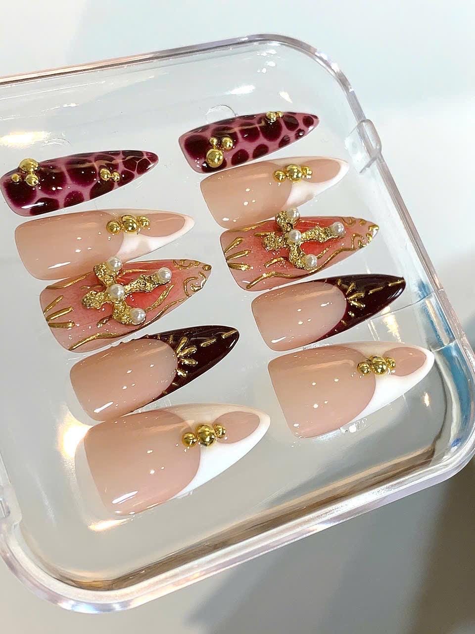 Baroque Burgundy Stiletto Press On Nails: Pearl Cross & Gold Accents