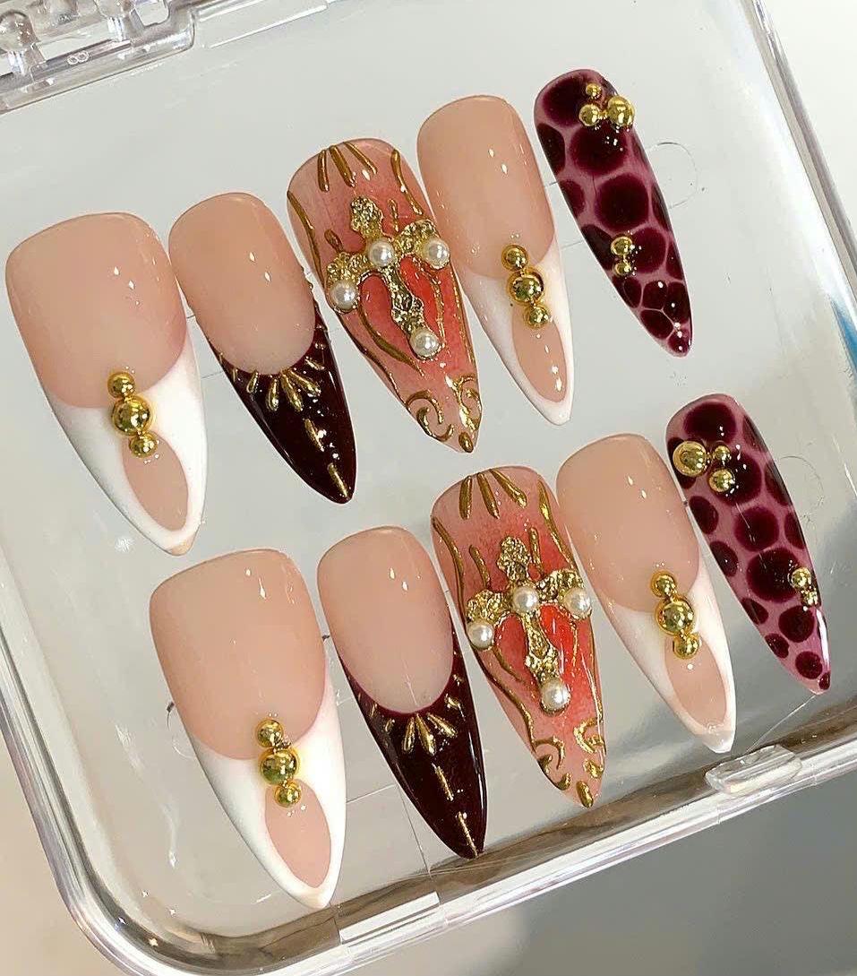 Baroque Burgundy Stiletto Press On Nails: Pearl Cross & Gold Accents