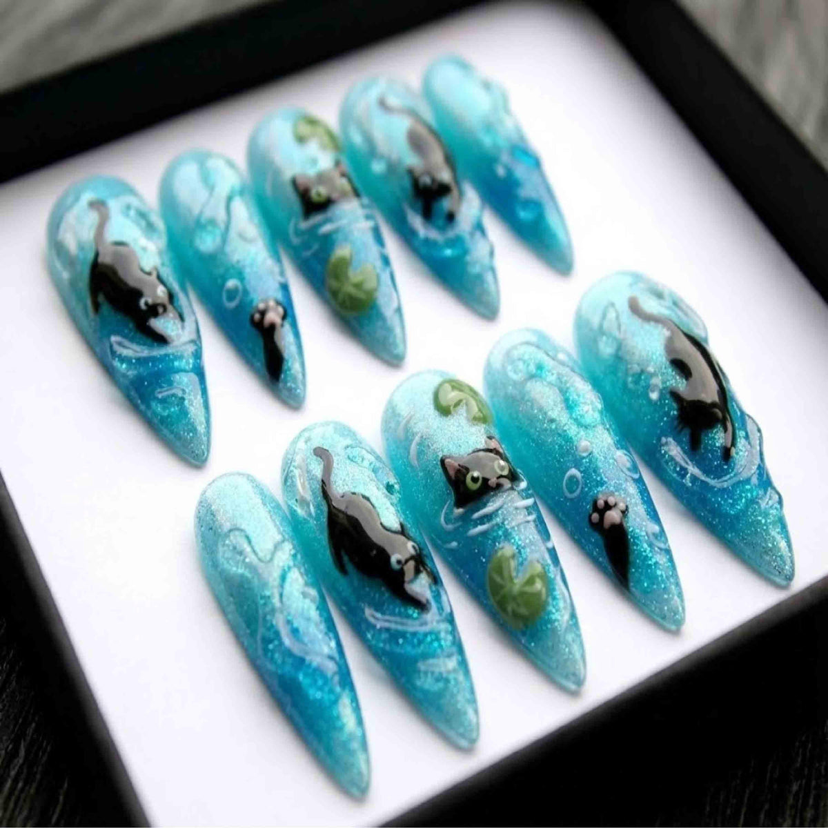 Handmade Swimming Cat Press On Nails | 3D Water Ripples & Blue Glitter | Long Stiletto For Whimsical Summer Mood