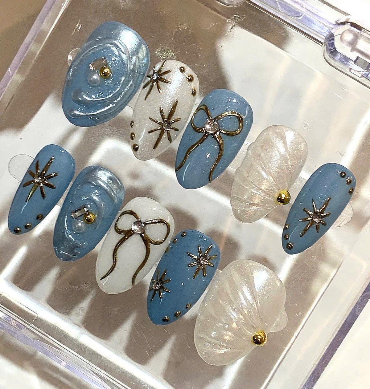 Blue Pearl Press On Nails – Shimmer Bow & Star Nail Art