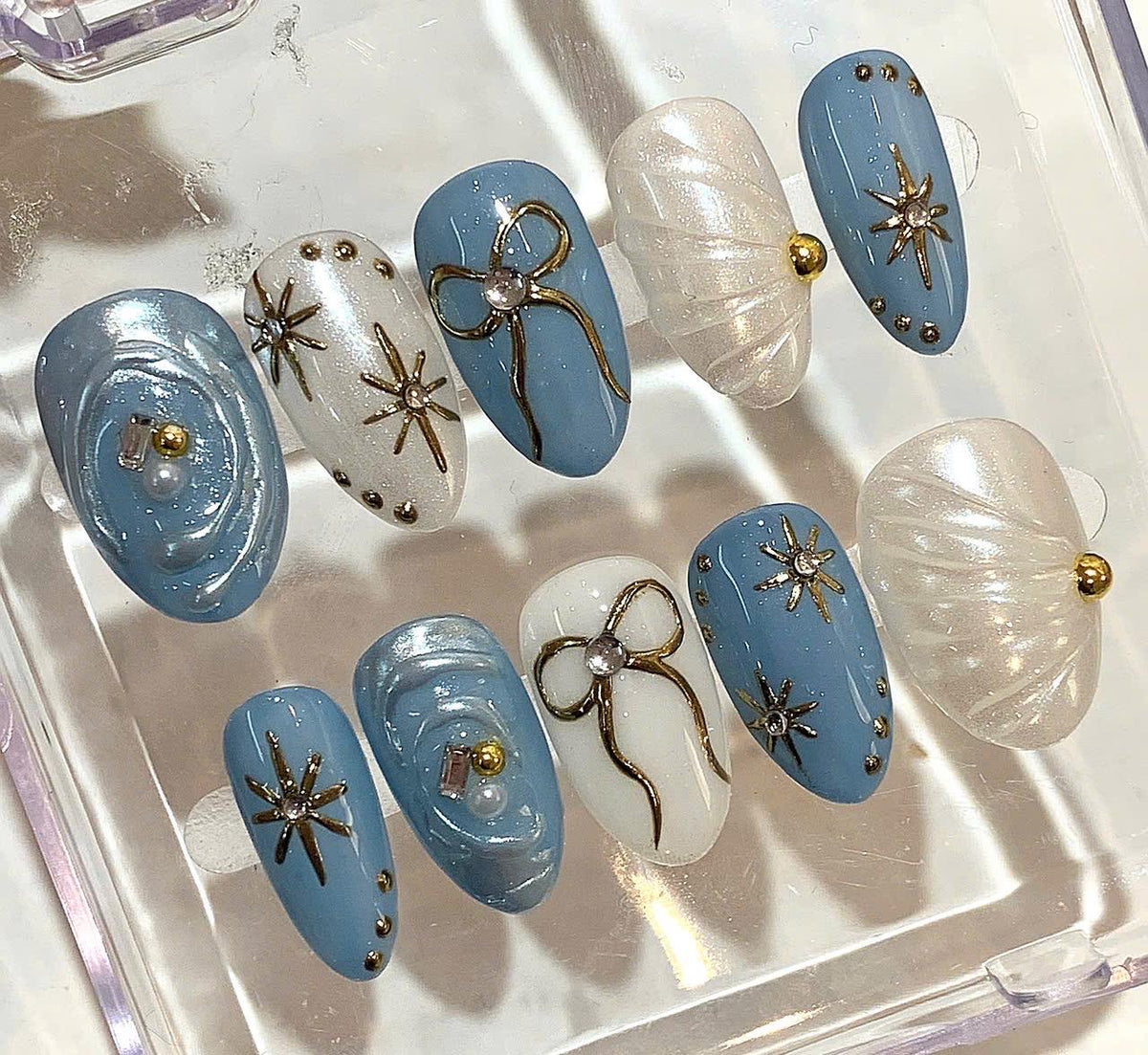 Blue Pearl Press On Nails – Shimmer Bow & Star Nail Art