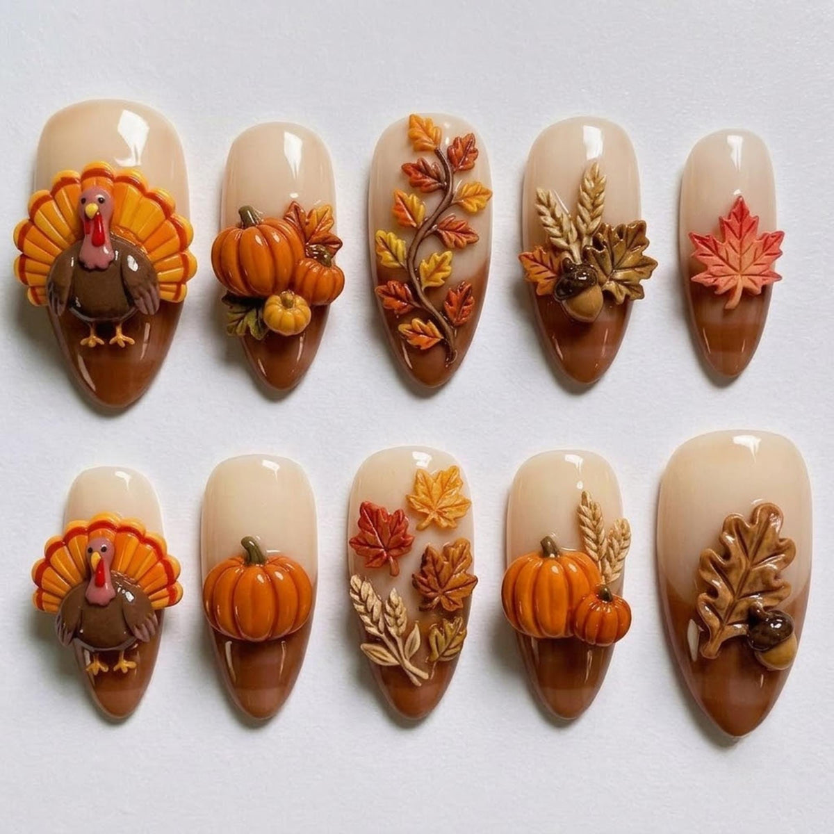 Thanksgiving Press On Nails | Cozy Fall Harvest Inspiration | Glossy Almond Nail Style | Maple Leaf Pumpkin Nail | 3D Turkey Acorn Nail Art